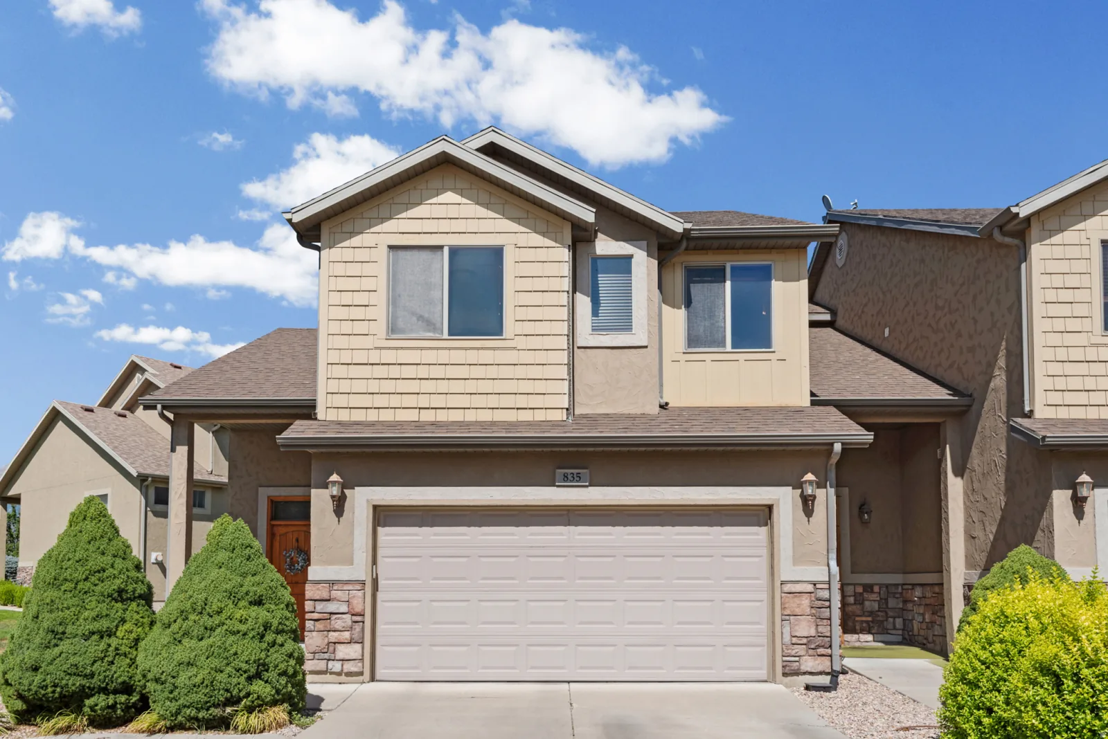 Front exterior of 835 S Fox Lane, an end-unit townhome in Orem, Utah
